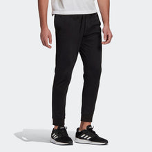 Laden Sie das Bild in den Galerie-Viewer, ESSENTIALS SINGLE JERSEY TAPERED CUFF PANTALONE UOMO
