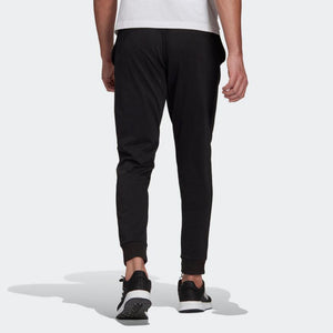 ESSENTIALS SINGLE JERSEY TAPERED CUFF PANTALONE UOMO